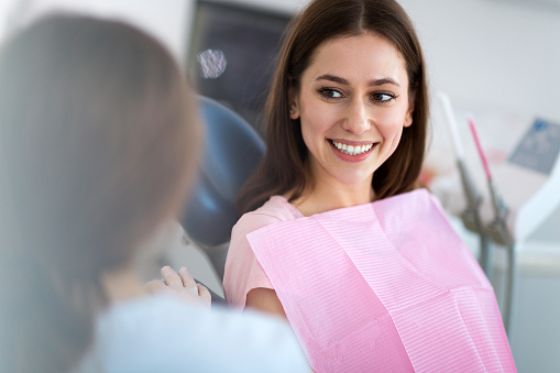 Dental patient looking at dentist at Hometown Dental in McMinnville, OR